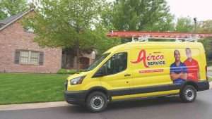 Airco Service van in a neighborhood