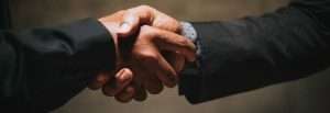 handshake from two people